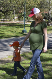 This is me all sorts of pregnant at the park with Parker the last  weekend before Austin was born