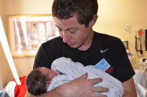 Uncle Justin holds his newest nephew
