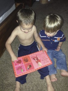 On the other hand, I get to be with these cuties all day (this is Parker reading to Austin)