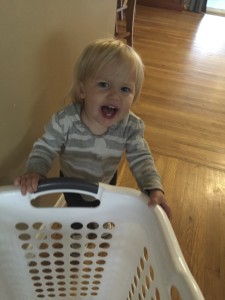 Audrey pushing a laundry basket